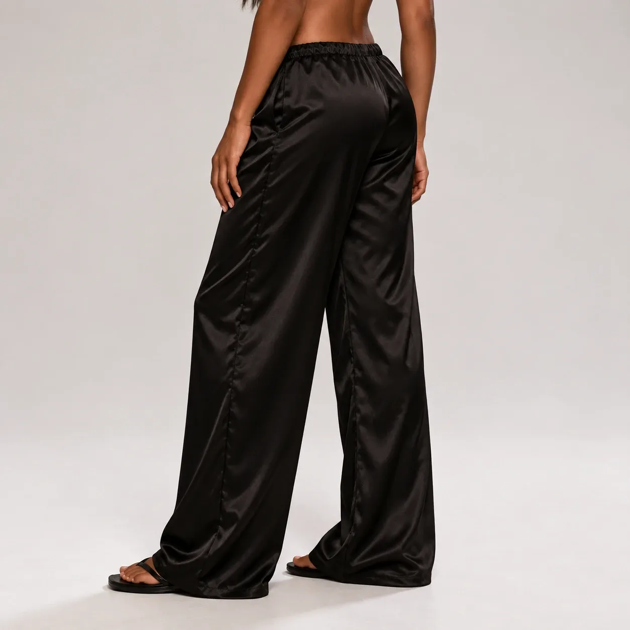 Noelle Satin Drawstring Trousers - Black supported alternative fit; styling accessories not included