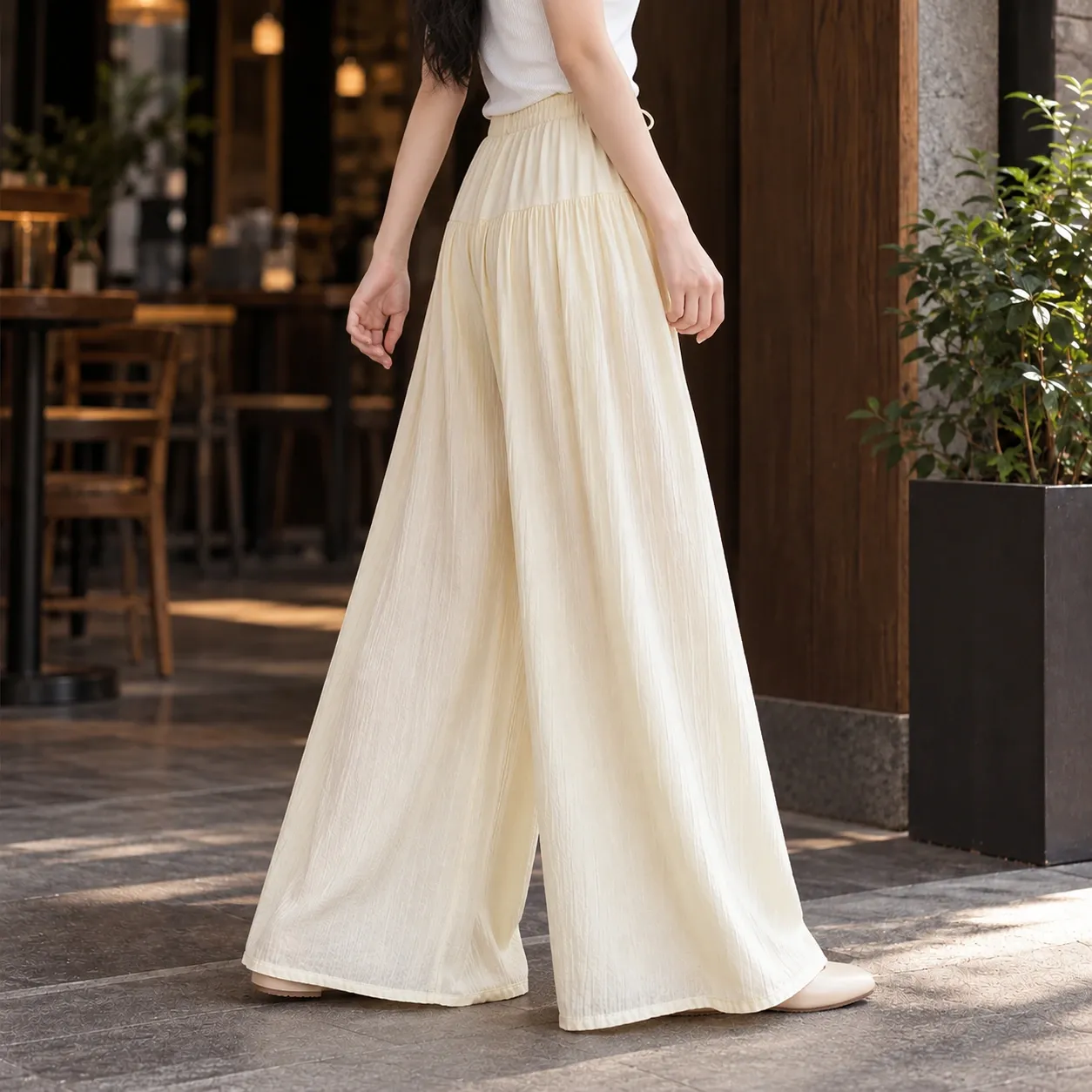Apolline Tiered Wide-Leg Trousers - Apricot source-backed side fit; styling accessories not included