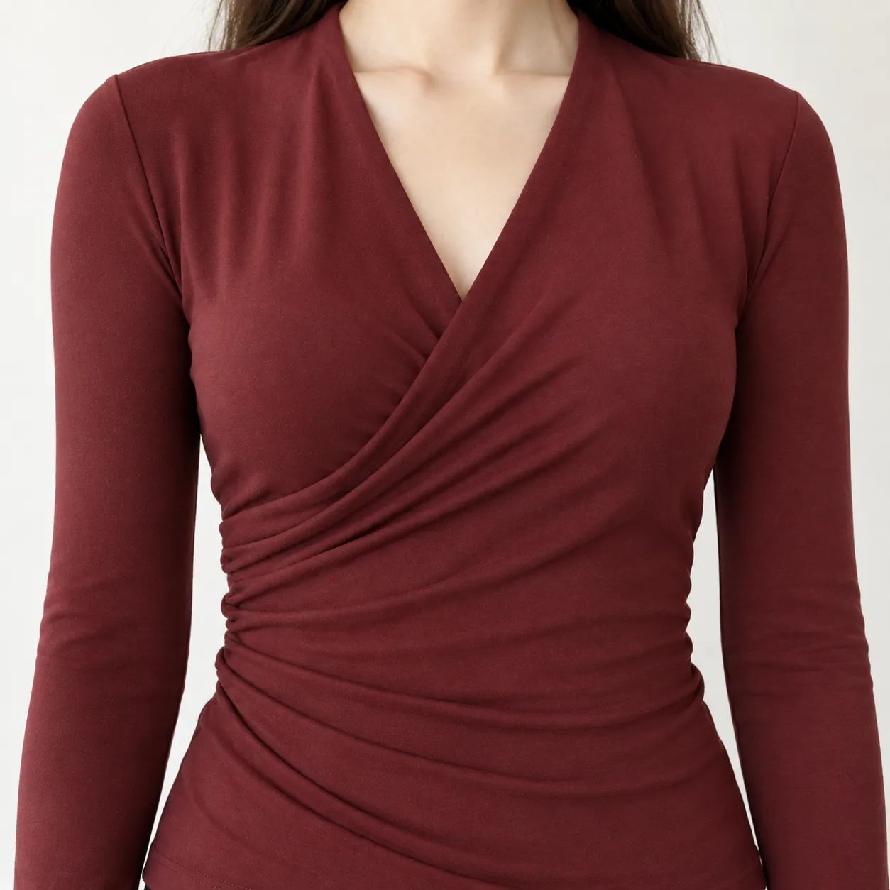 Mara Wrap-Effect Top in Burgundy: detail photograph