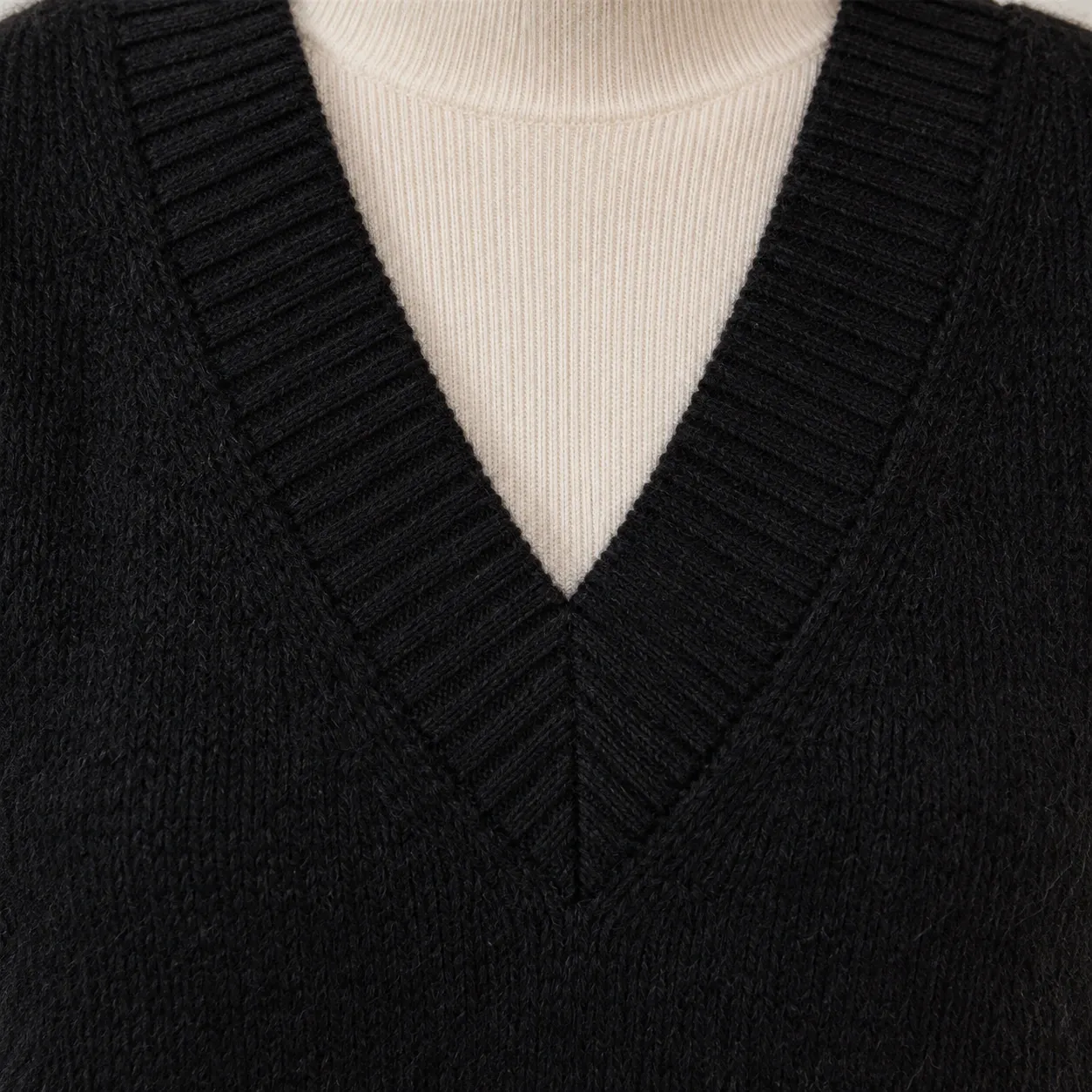 Bertille V-Neck Knit Dress - Black V-neck ribbing and knit construction; styling accessories not included