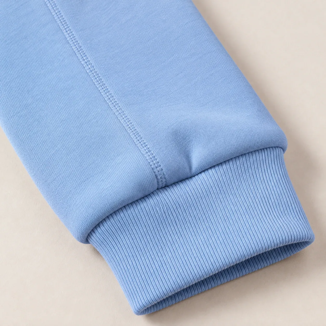 Celestine Cropped Sweatshirt - Sky Blue exterior cuff and flatlock seam; styling accessories not included