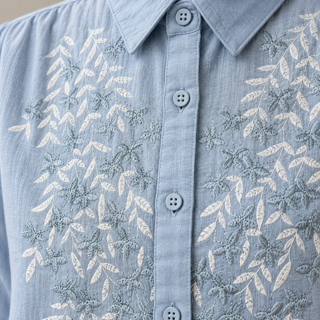 Eglantine Embroidered Blouse - Blue embroidery and crinkled fabric detail; styling accessories not included